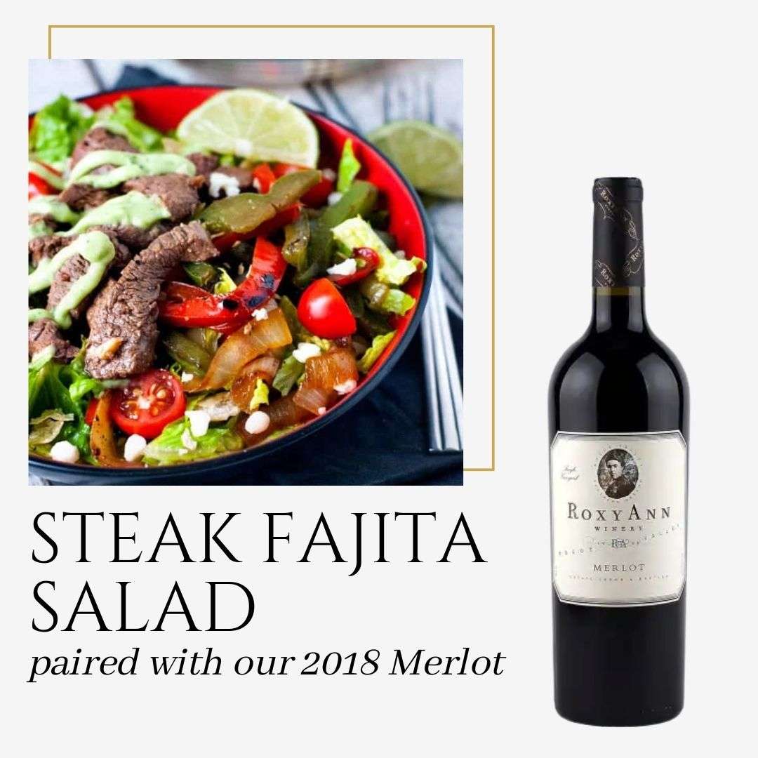 An image from Quick & Healthy Recipes And Their Wine Pairings by RoxyAnn Winery. The image depicts a bowl of steak fajita salad and also shows a bottle of RoxyAnn 2018 Merlot. The caption on the graphic says "Steak Fajita Salad paired with our 2018 Merlot." 