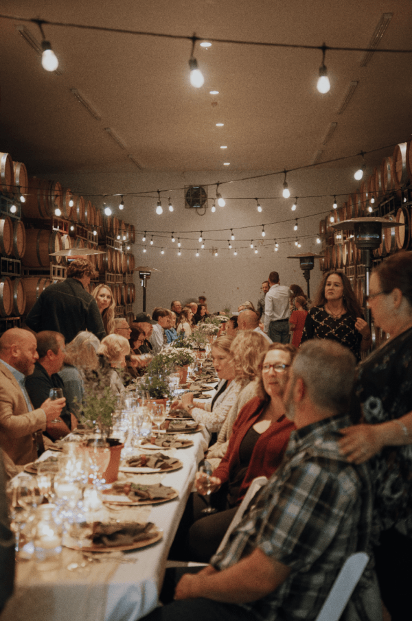 Guests enjoying the RoxyAnn Winery harvest dinner in Medford, Oregon.