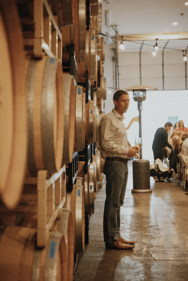 Chad Day, co-owner of RoxyAnn Winery sharing some thoughts with the guests of the Harvest Dinner.