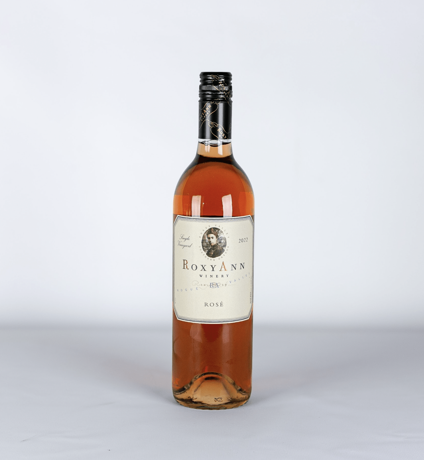 An image of the RoxyAnn Winery Rosé wine, a delightful pink wine with notes of raspberry that add a light, summery element to any fall wine cocktail.