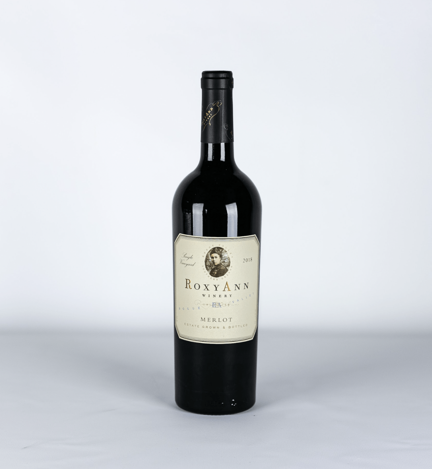 An image of the RoxyAnn Merlot. The rich notes of blackberry and spice in this delicious red wine are a delectable contribution to any fall wine cocktail or beverage.